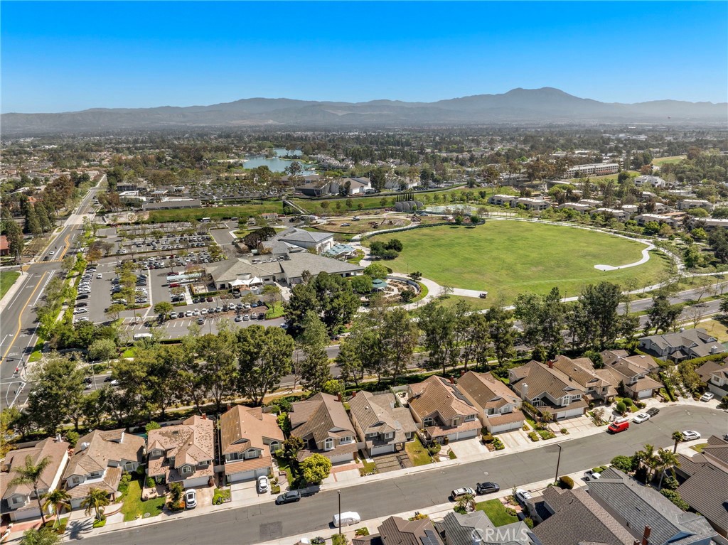 11 Bayside Irvine, CA 92614 - Photo 36 of 37 an aerial view of residential houses with outdoor space and trees