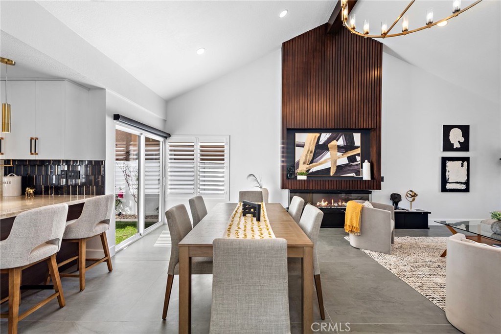 11 Bayside Irvine, CA 92614 - Photo 9 of 37 a living room with furniture and a large window