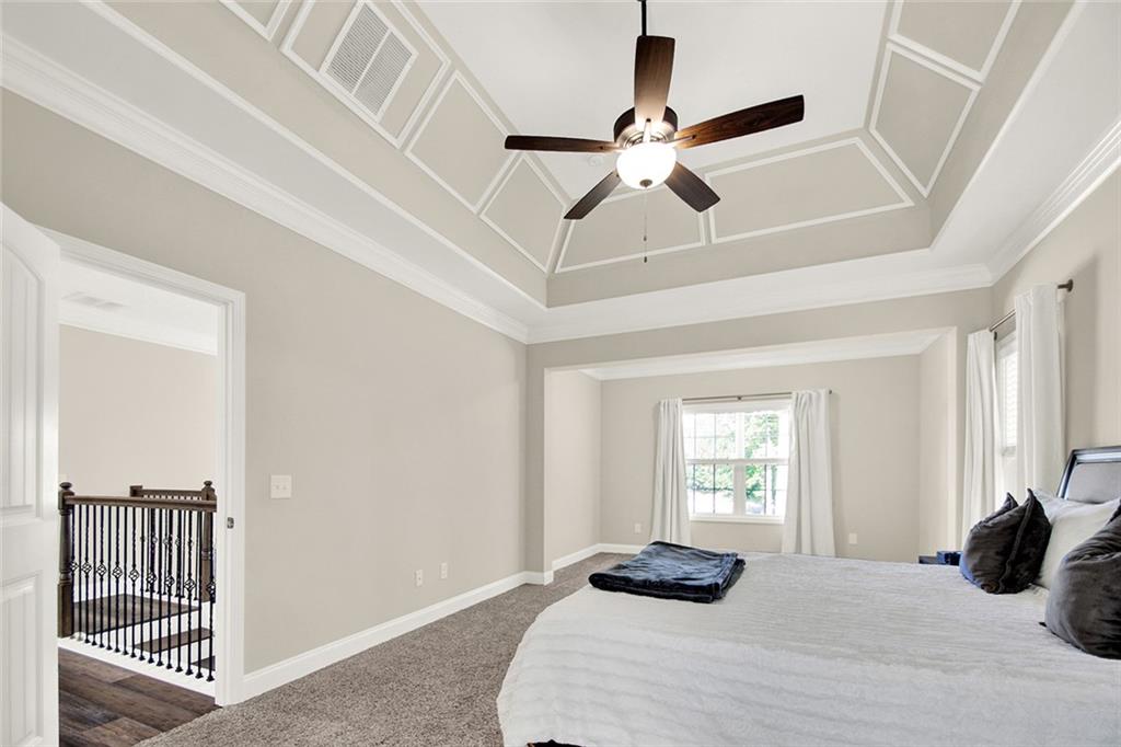 407 Corinth Church Road Winder, GA 30680 - Photo 45 of 66 a bedroom with a bed and a window