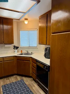 a view of cabinets and utility room