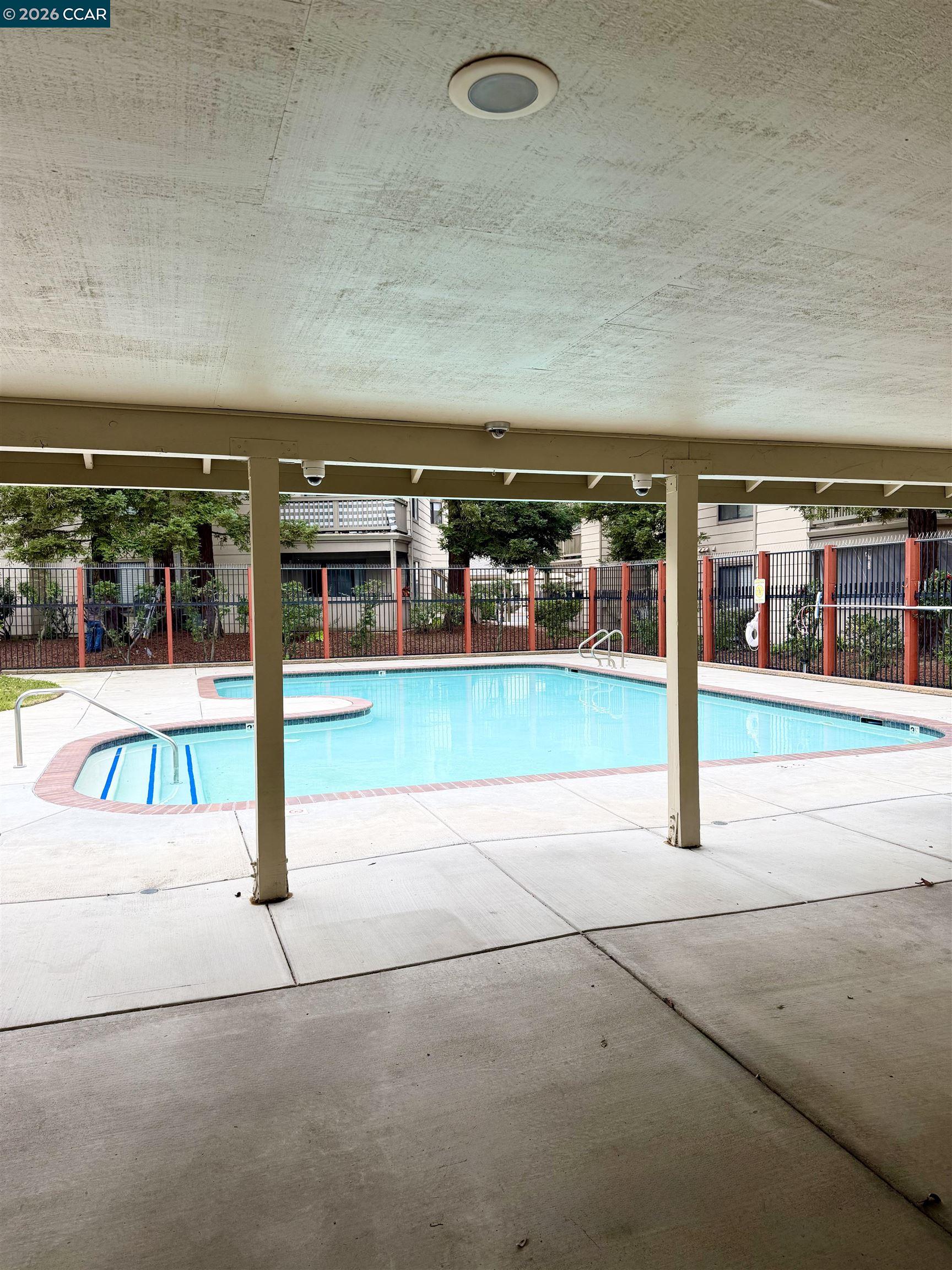 801 Dover Hercules, CA 94547 - Photo 17 of 19 a view of a swimming pool with an outdoor seating