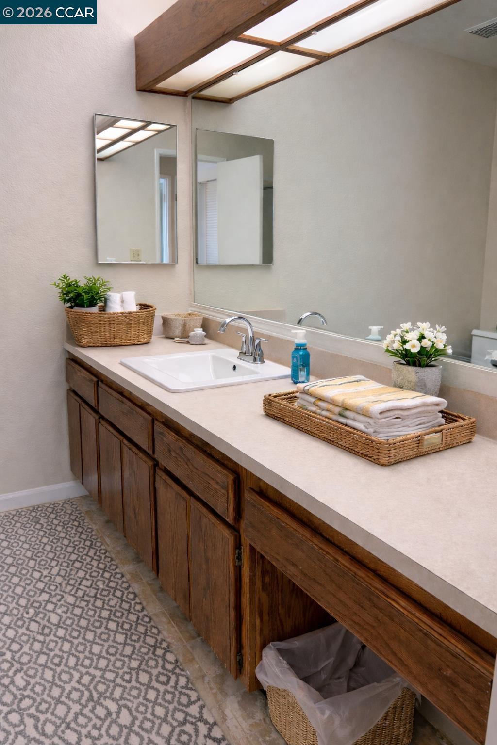 801 Dover Hercules, CA 94547 - Photo 9 of 19 a bathroom with a sink and a mirror