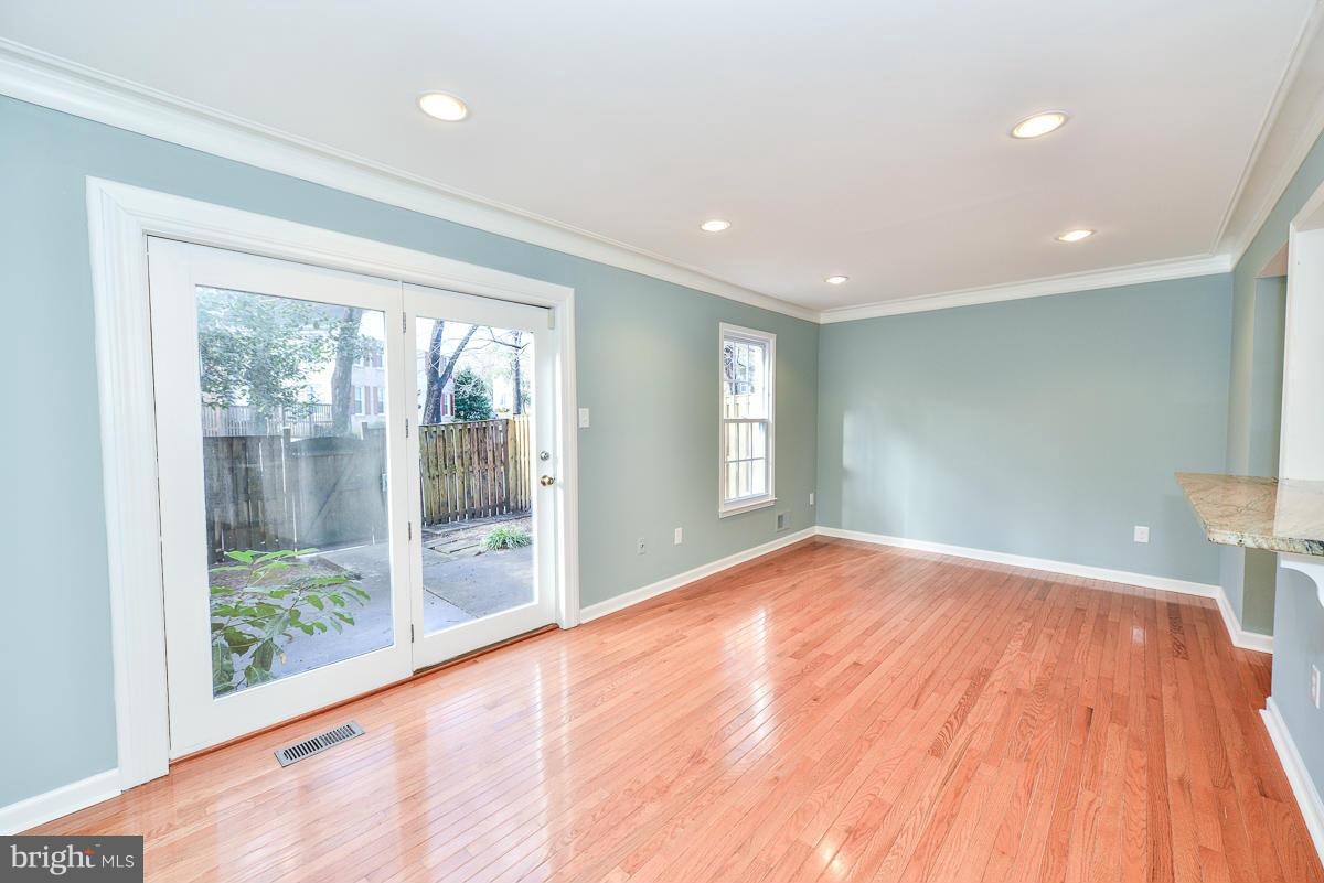 2407 Alsop Court Reston, VA 20191 - Photo 12 of 30 a view of empty room with wooden floor and fan