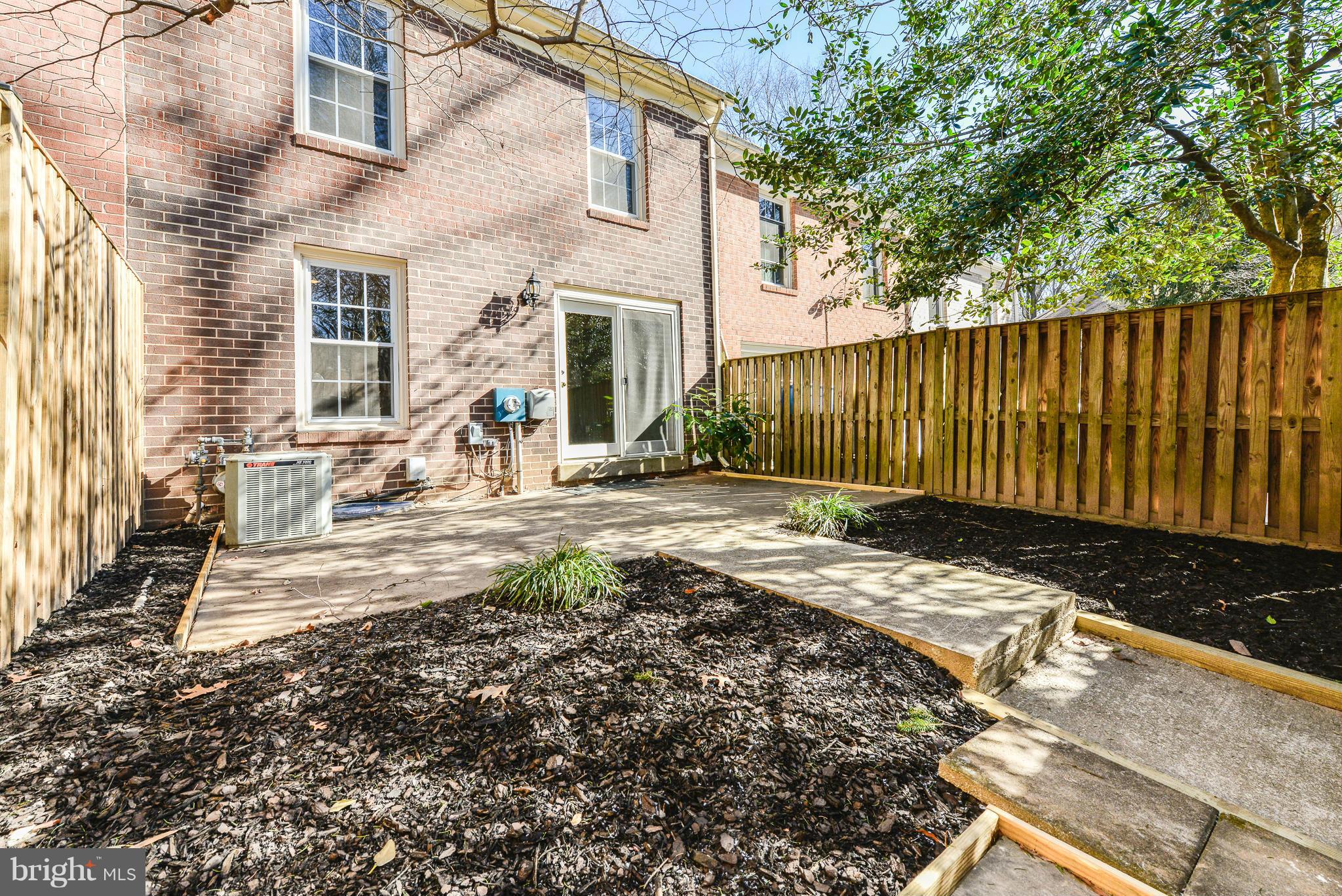 2407 Alsop Court Reston, VA 20191 - Photo 14 of 30 a view of a house with backyard and sitting area