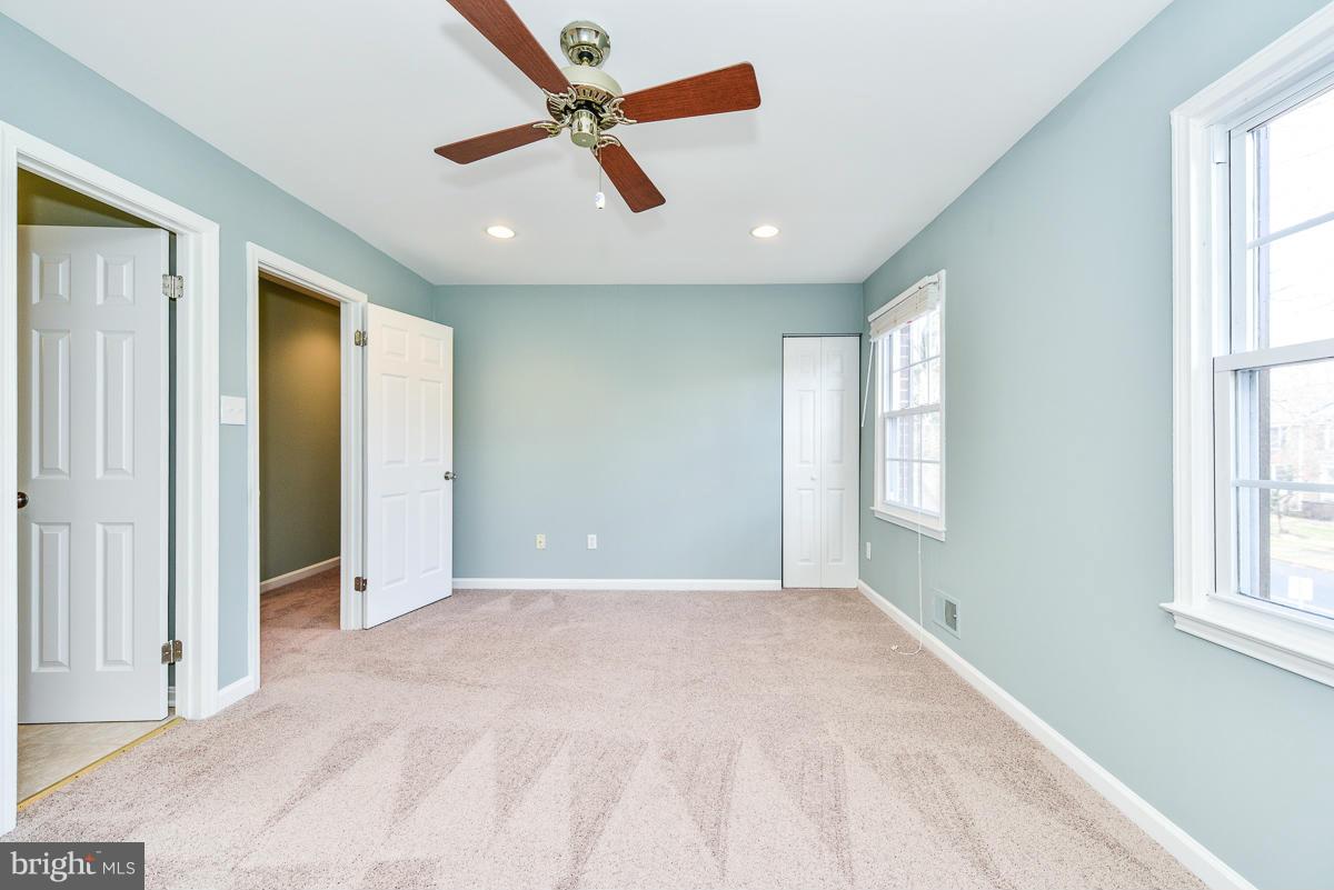 2407 Alsop Court Reston, VA 20191 - Photo 18 of 30 a view of an empty room with a window