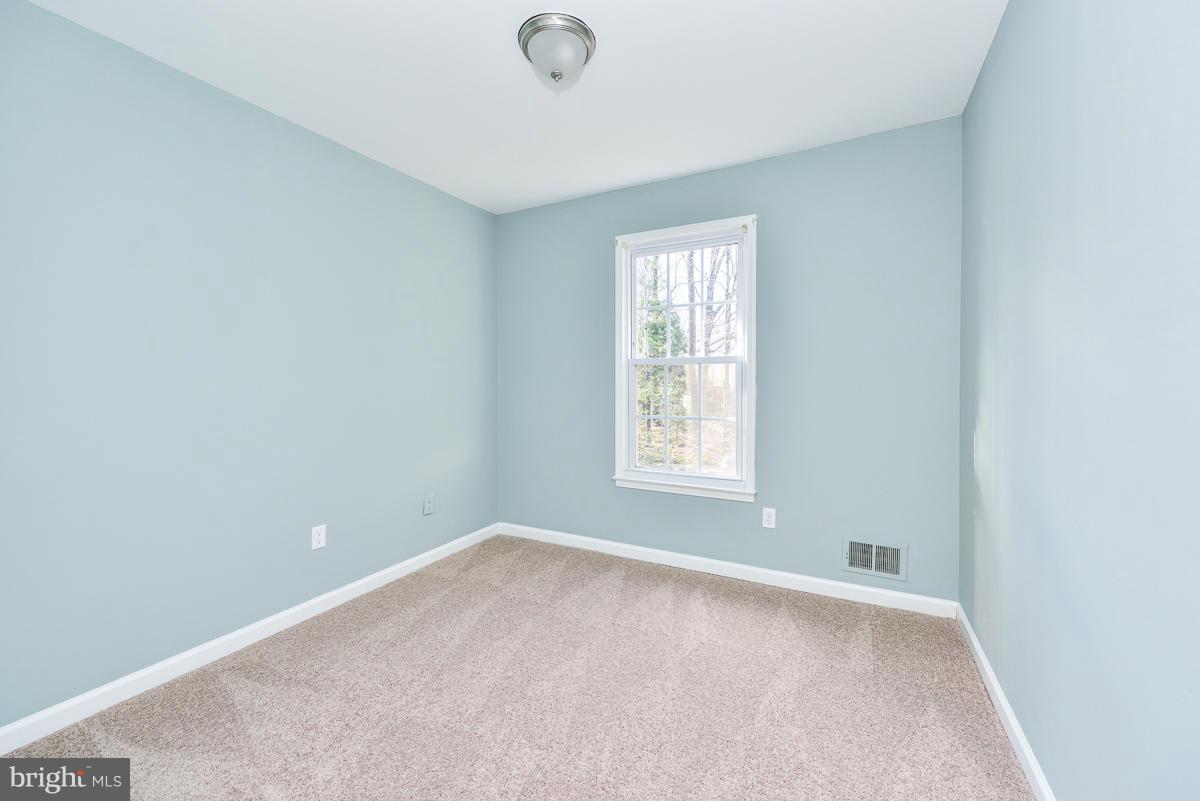 2407 Alsop Court Reston, VA 20191 - Photo 23 of 30 an empty room with a window
