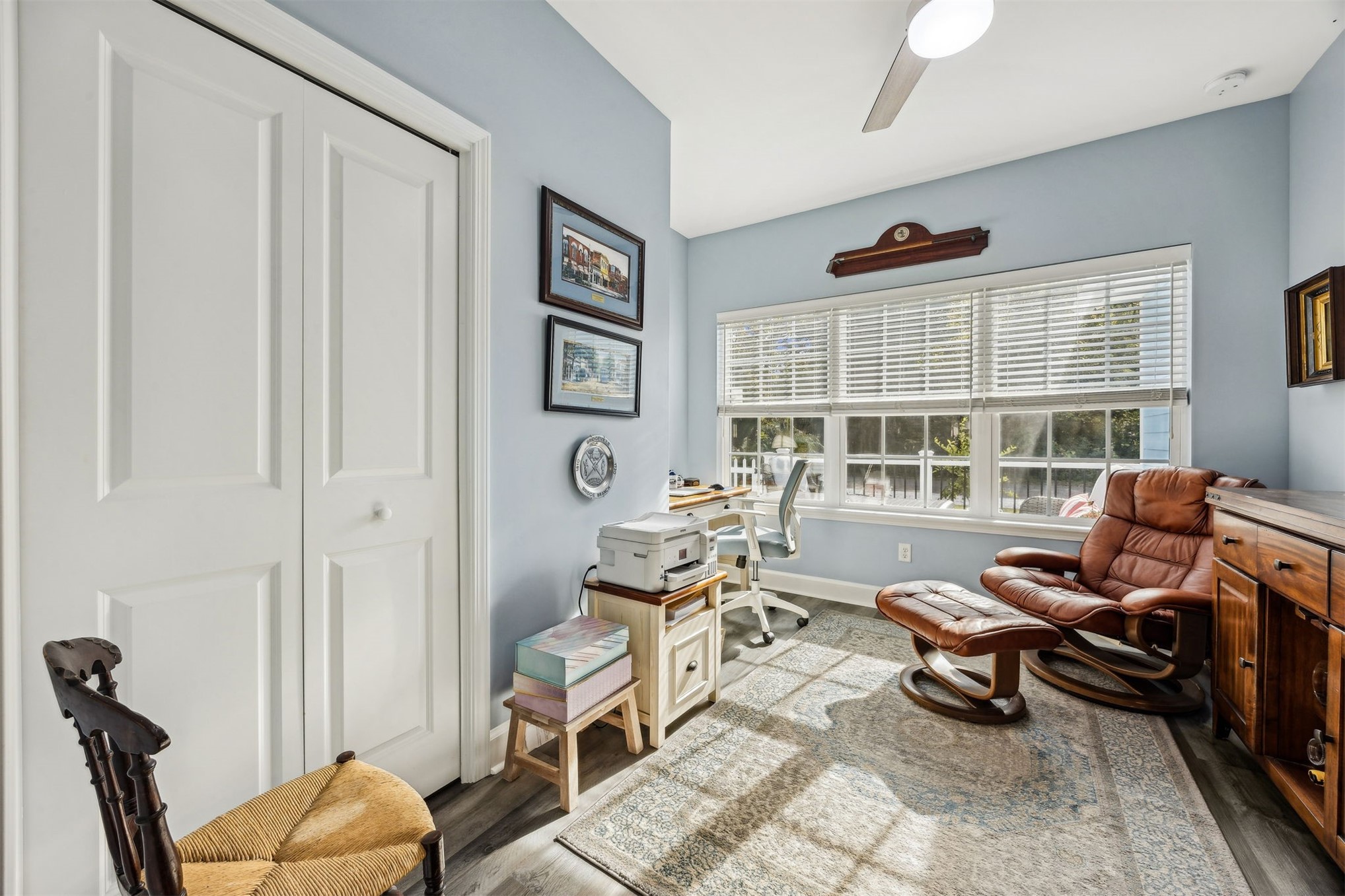 307 Elm Street Fernandina Beach, FL 32034 - Photo 22 of 35 a living room with furniture and a floor to ceiling window
