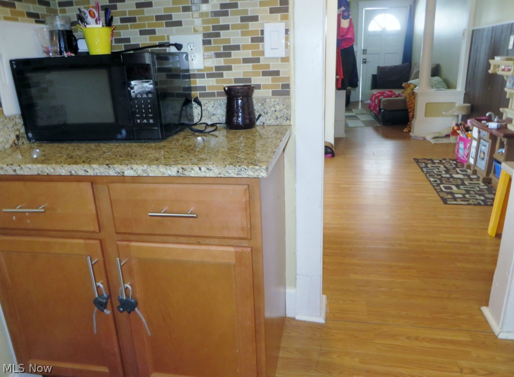 1334-1336 Craneing Road Wickliffe, OH 44092 - Photo 19 of 25 Granite Counter in Right side occupied by tenant.