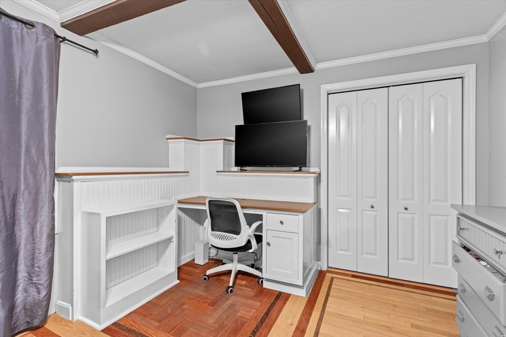 116 Weare Street Lawrence, MA 01843 - Photo 15 of 25 a view of a workspace with furniture and wooden floor