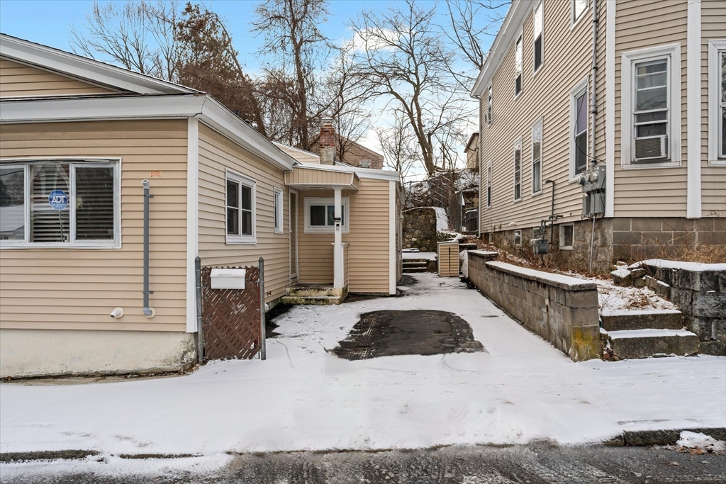 116 Weare Street Lawrence, MA 01843 - Photo 24 of 25 a view of a house with a yard