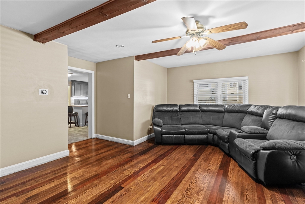 116 Weare Street Lawrence, MA 01843 - Photo 7 of 25 a living room with furniture and a ceiling fan