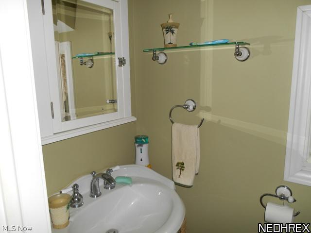 17 Parrish Road Conneaut, OH 44030 - Photo 9 of 18 MASTER HALF BATHROOM