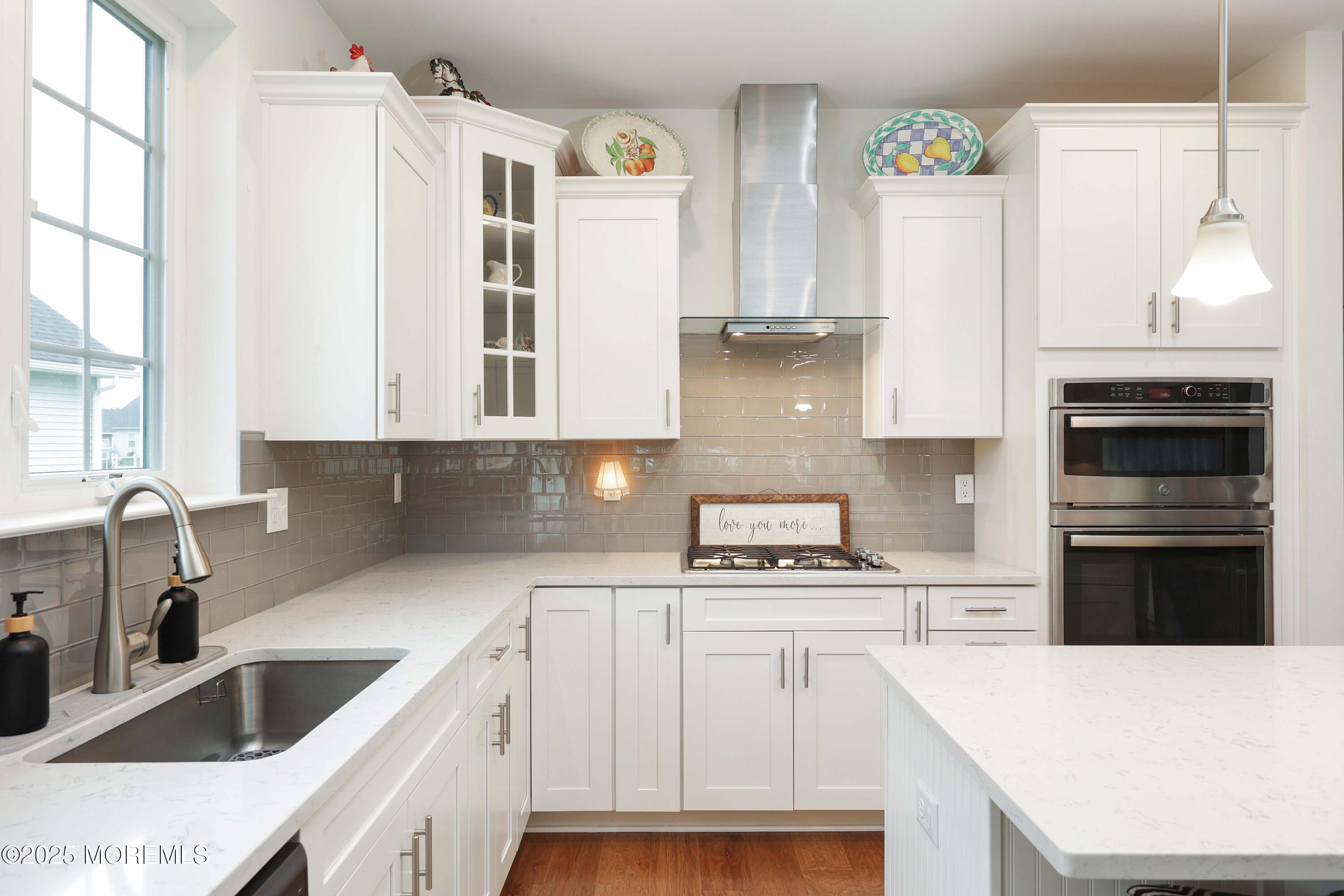 152 Edenton Drive Barnegat, NJ 08005 - Photo 11 of 36 a kitchen with granite countertop a stove and a sink