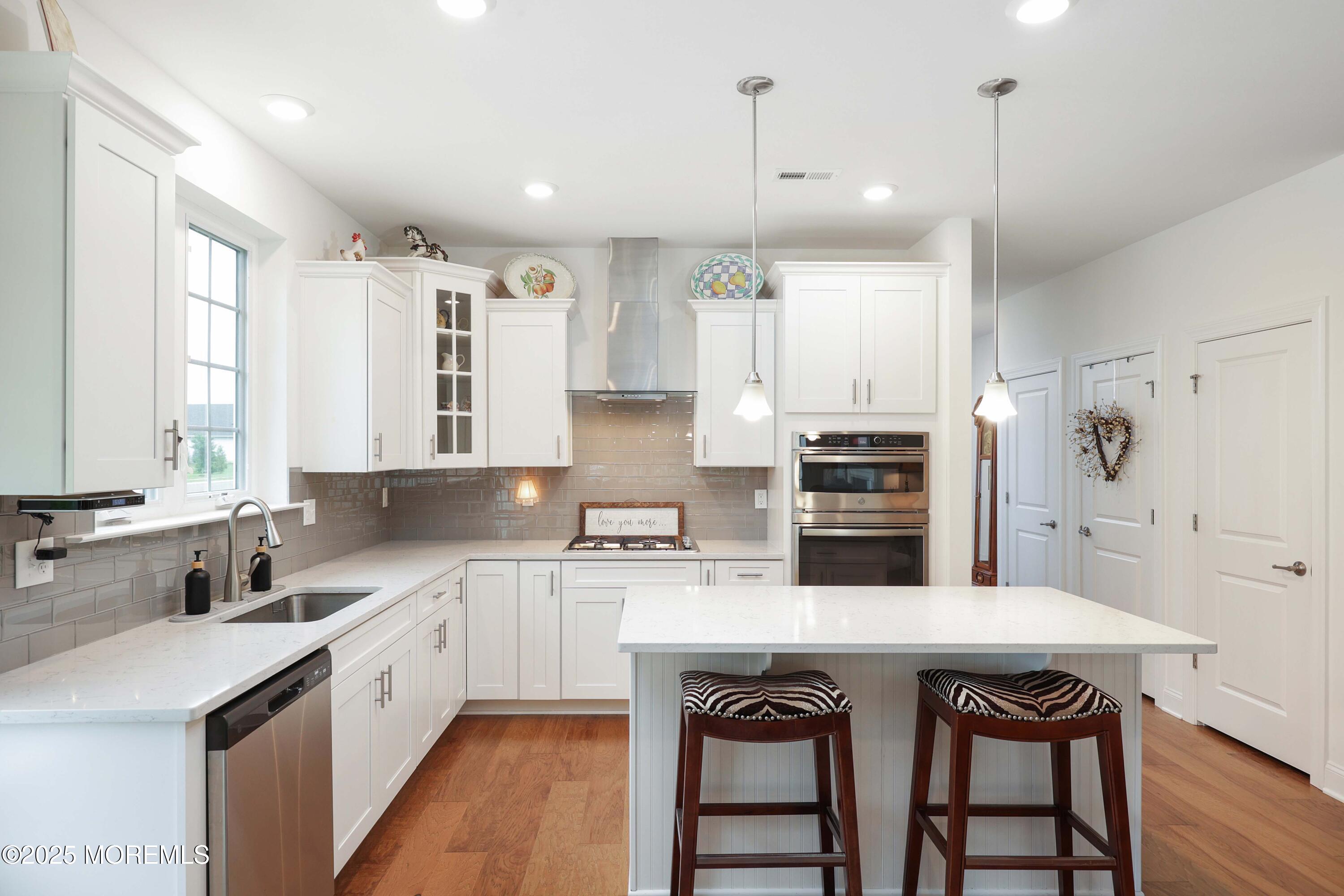 152 Edenton Drive Barnegat, NJ 08005 - Photo 12 of 36 a kitchen with a sink stove and refrigerator