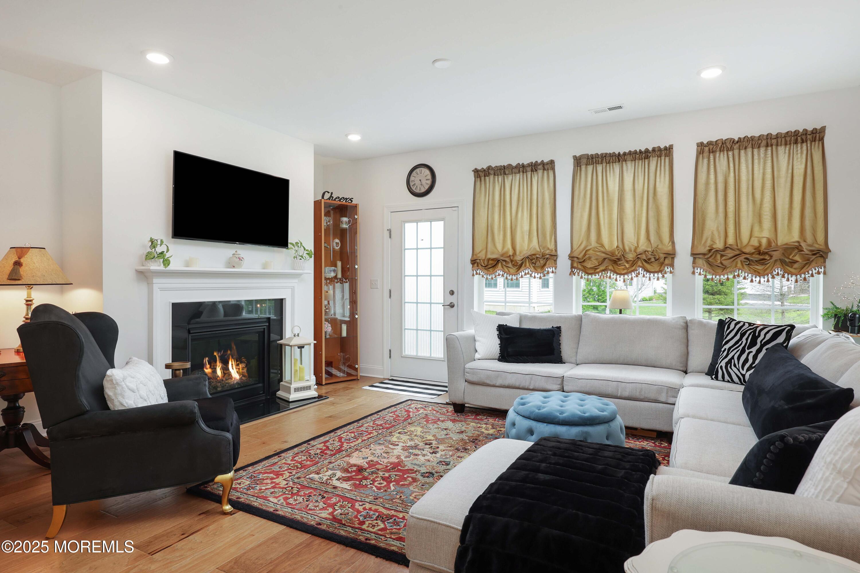 152 Edenton Drive Barnegat, NJ 08005 - Photo 14 of 36 a living room with furniture fireplace and window