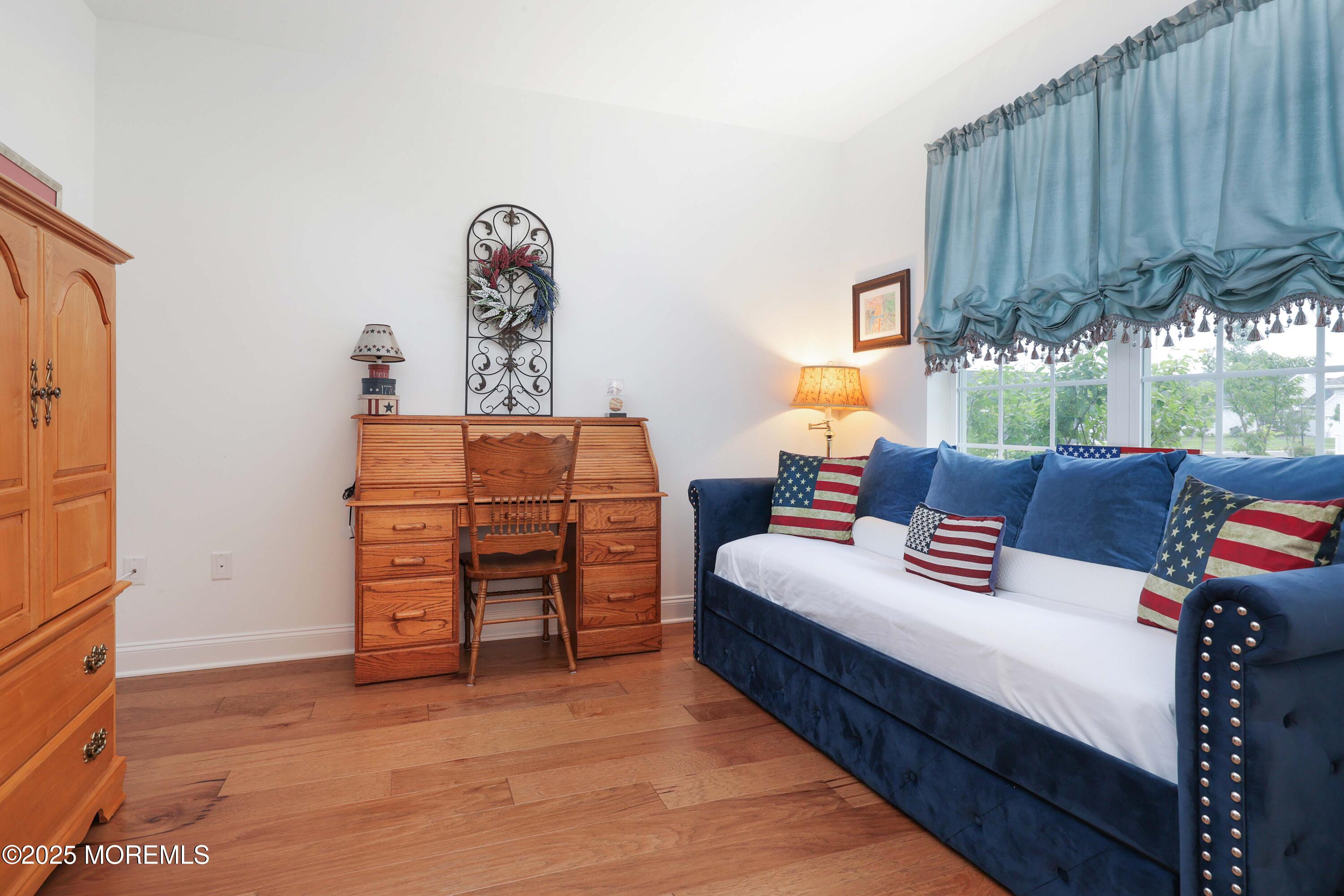 152 Edenton Drive Barnegat, NJ 08005 - Photo 15 of 36 a living room with furniture and a cabinet