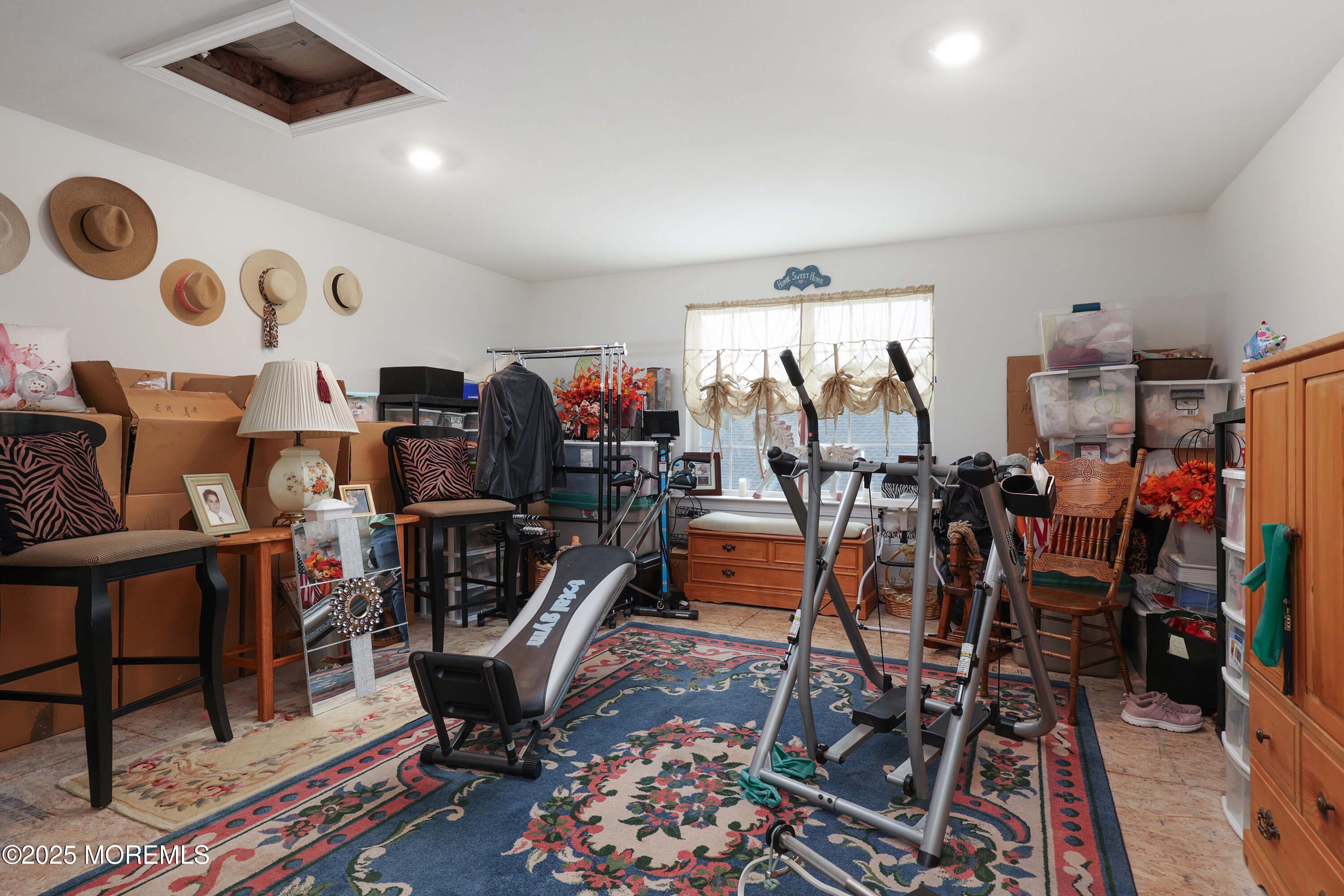 152 Edenton Drive Barnegat, NJ 08005 - Photo 25 of 36 a view of a room with gym equipment