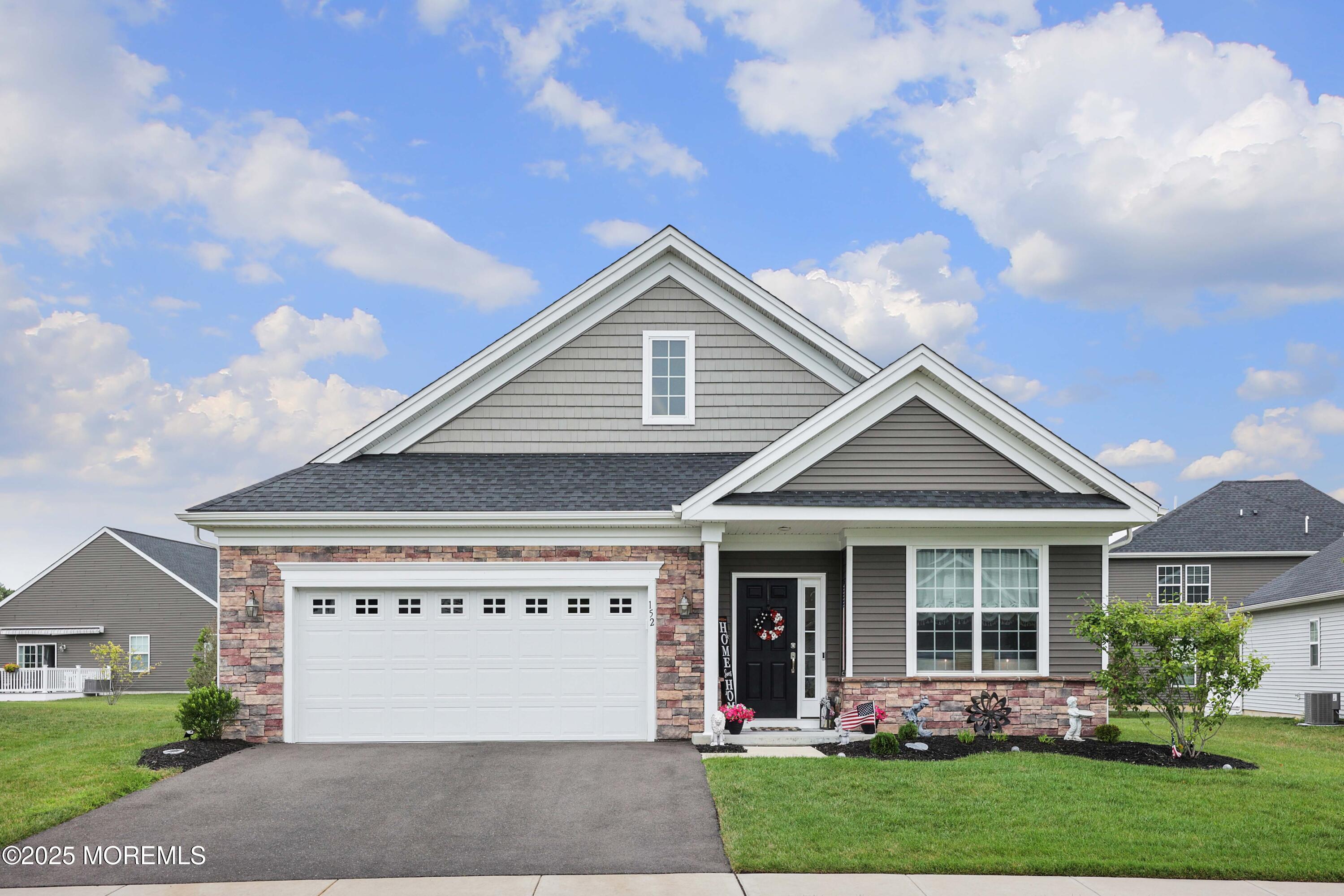 152 Edenton Drive Barnegat, NJ 08005 - Photo 35 of 36 a front view of a house with a yard