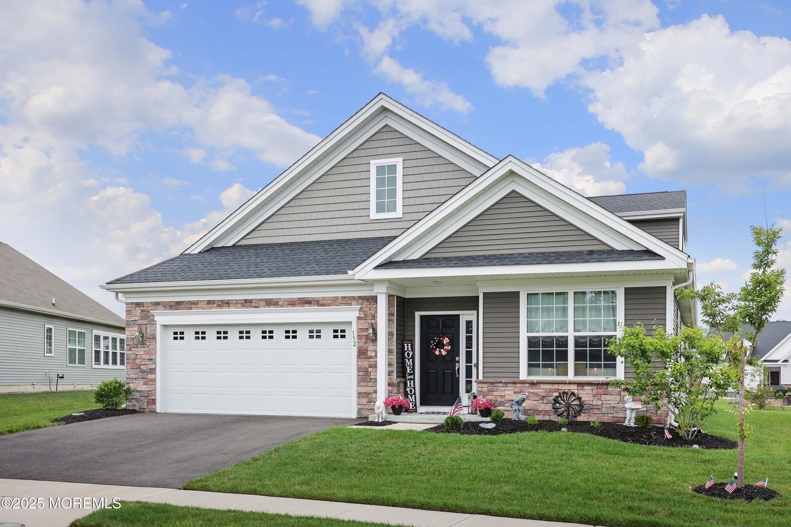152 Edenton Drive Barnegat, NJ 08005 - Photo 36 of 36 a view of a house with a yard potted plants and a large tree
