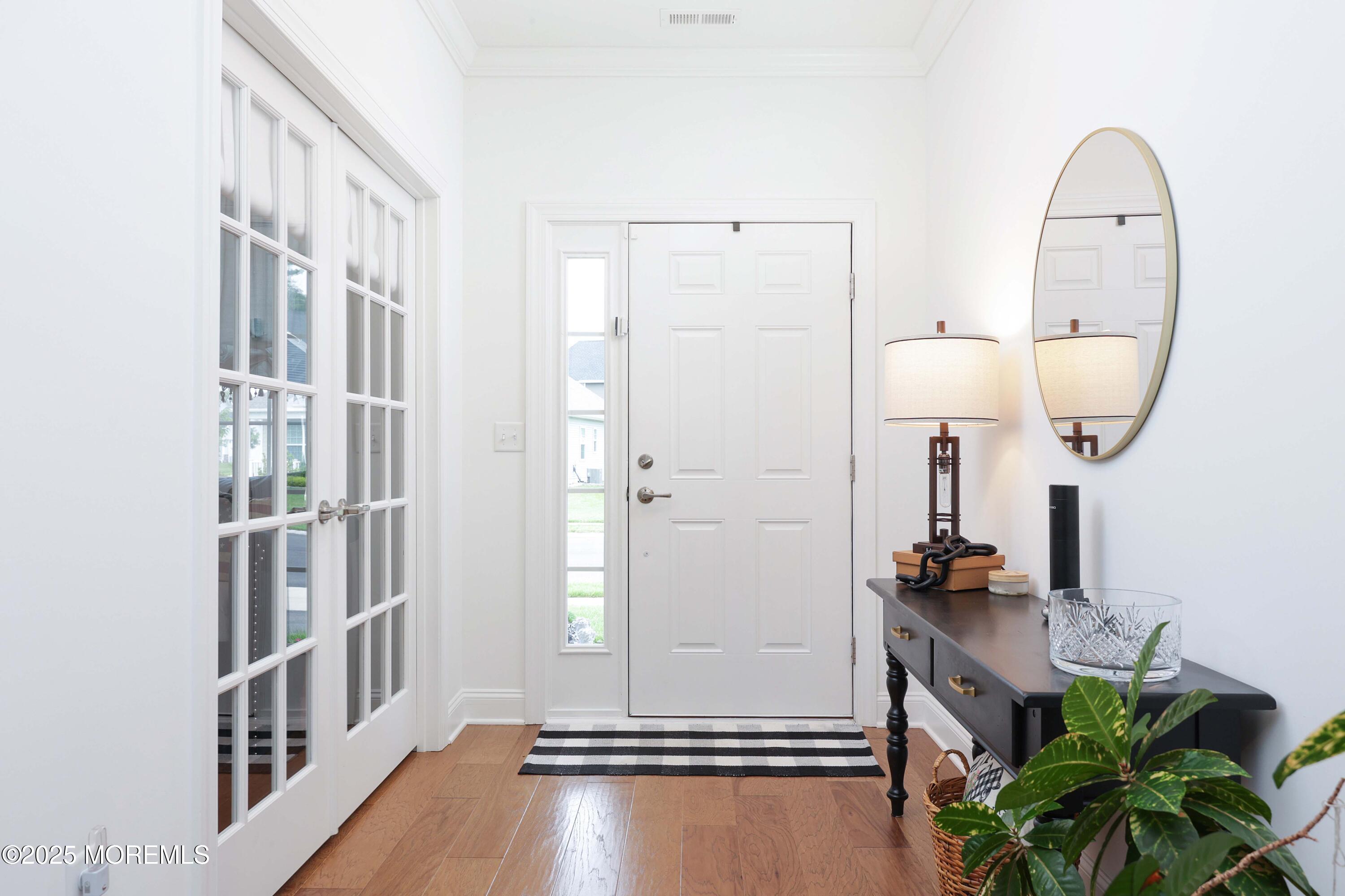 152 Edenton Drive Barnegat, NJ 08005 - Photo 4 of 36 a view of an entryway with wooden floor