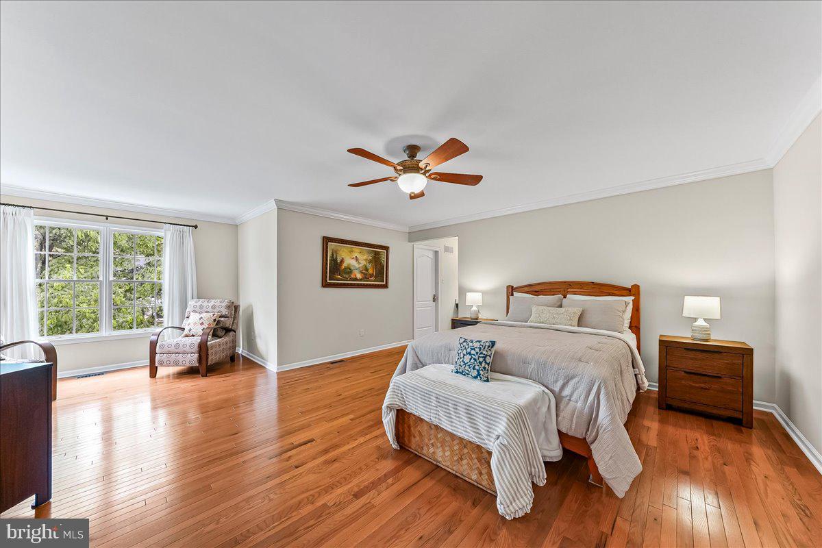 408 Brentford Road Kennett Square, PA 19348 - Photo 20 of 41 a bedroom with a bed and a large window