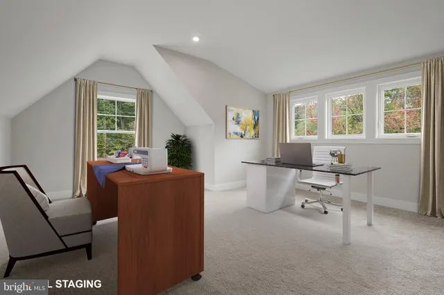 a living room with furniture and window