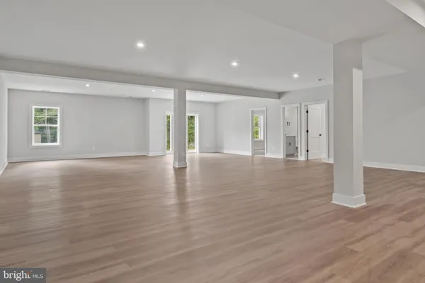 a view of a livingroom with wooden floor