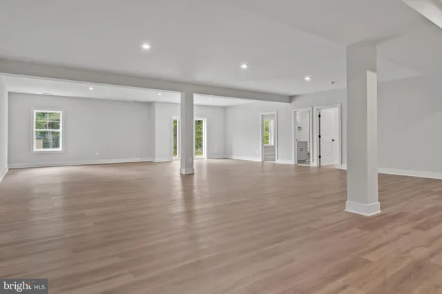 a view of a livingroom with wooden floor