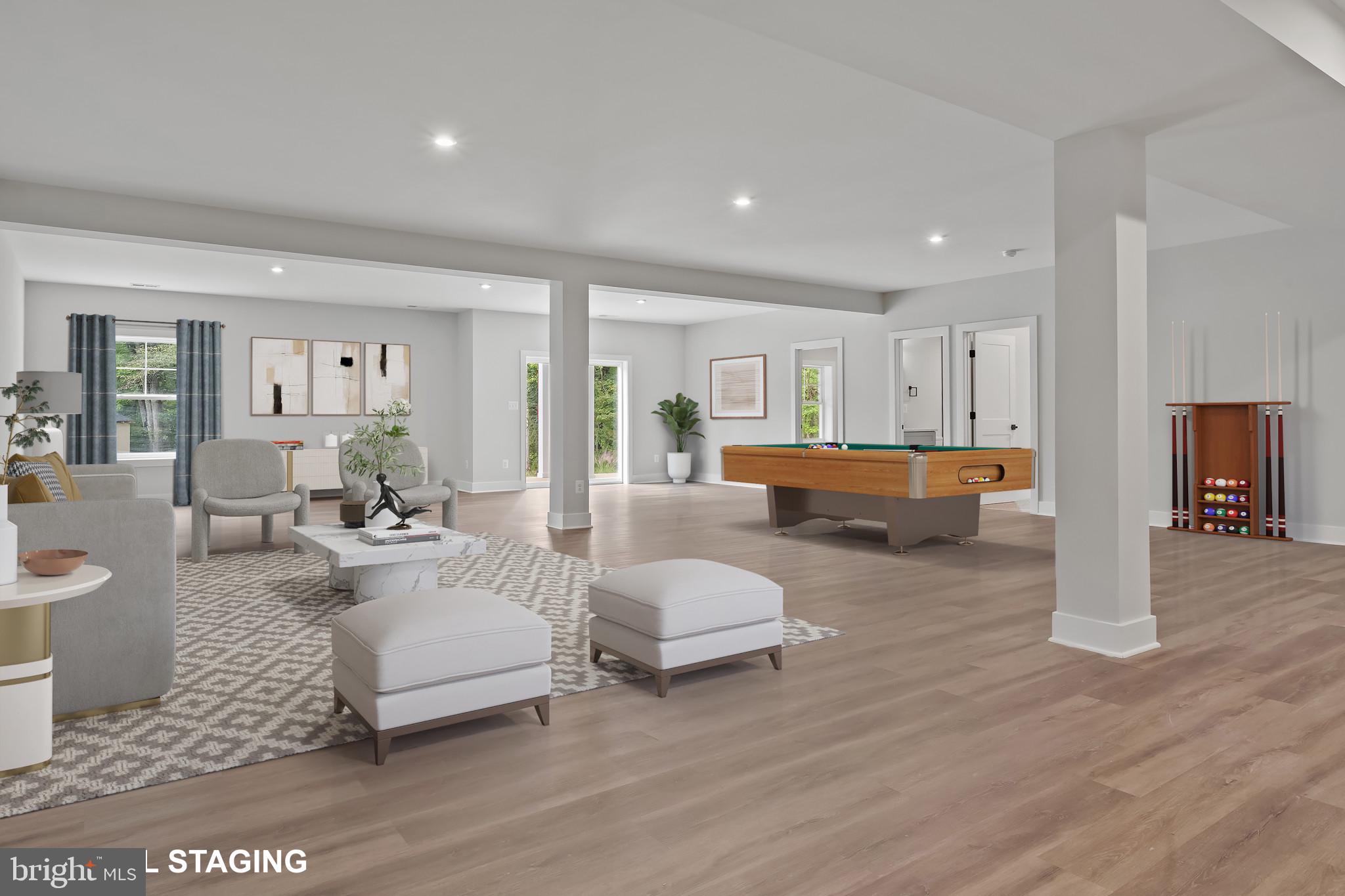 11516 Smithfield Road Manassas, VA 20112 - Photo 32 of 38 a living room with furniture and a wooden floor