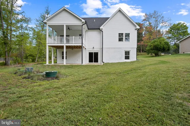 a front view of a house with yard