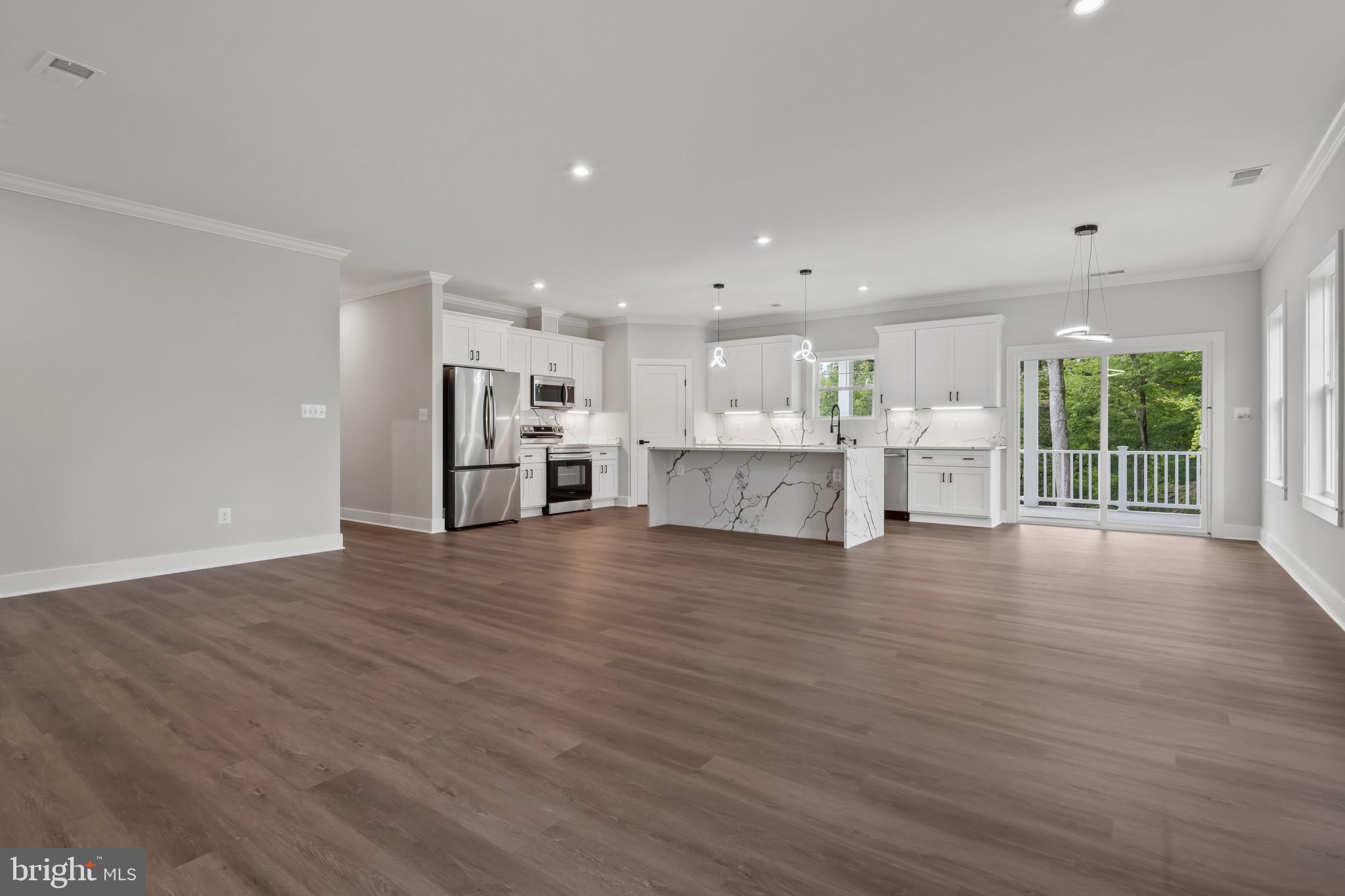 11516 Smithfield Road Manassas, VA 20112 - Photo 7 of 38 a view of kitchen with refrigerator and window