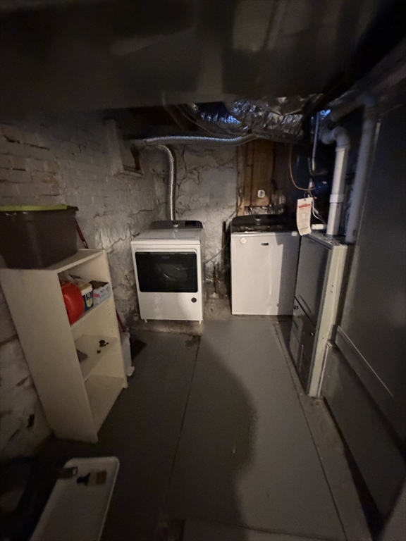 11 King Street, Unit 2 Swampscott, MA 01907 - Photo 8 of 8 a kitchen with refrigerator and microwave