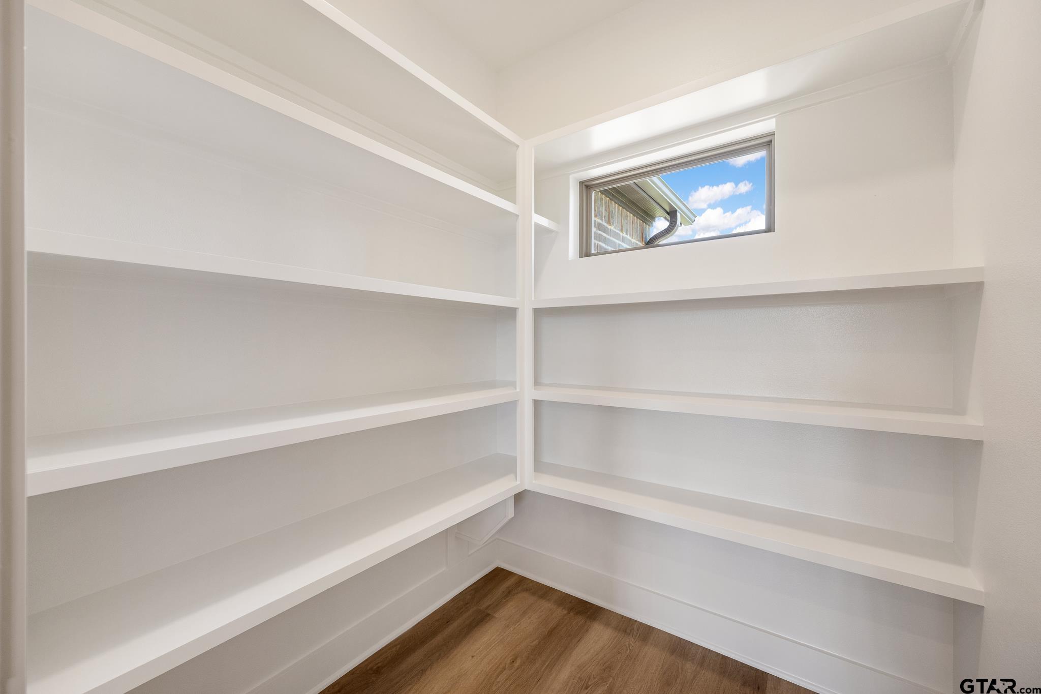 508 Artesian Meadow Drive Bullard, TX 75757 - Photo 19 of 46 a view of an empty walk in closet