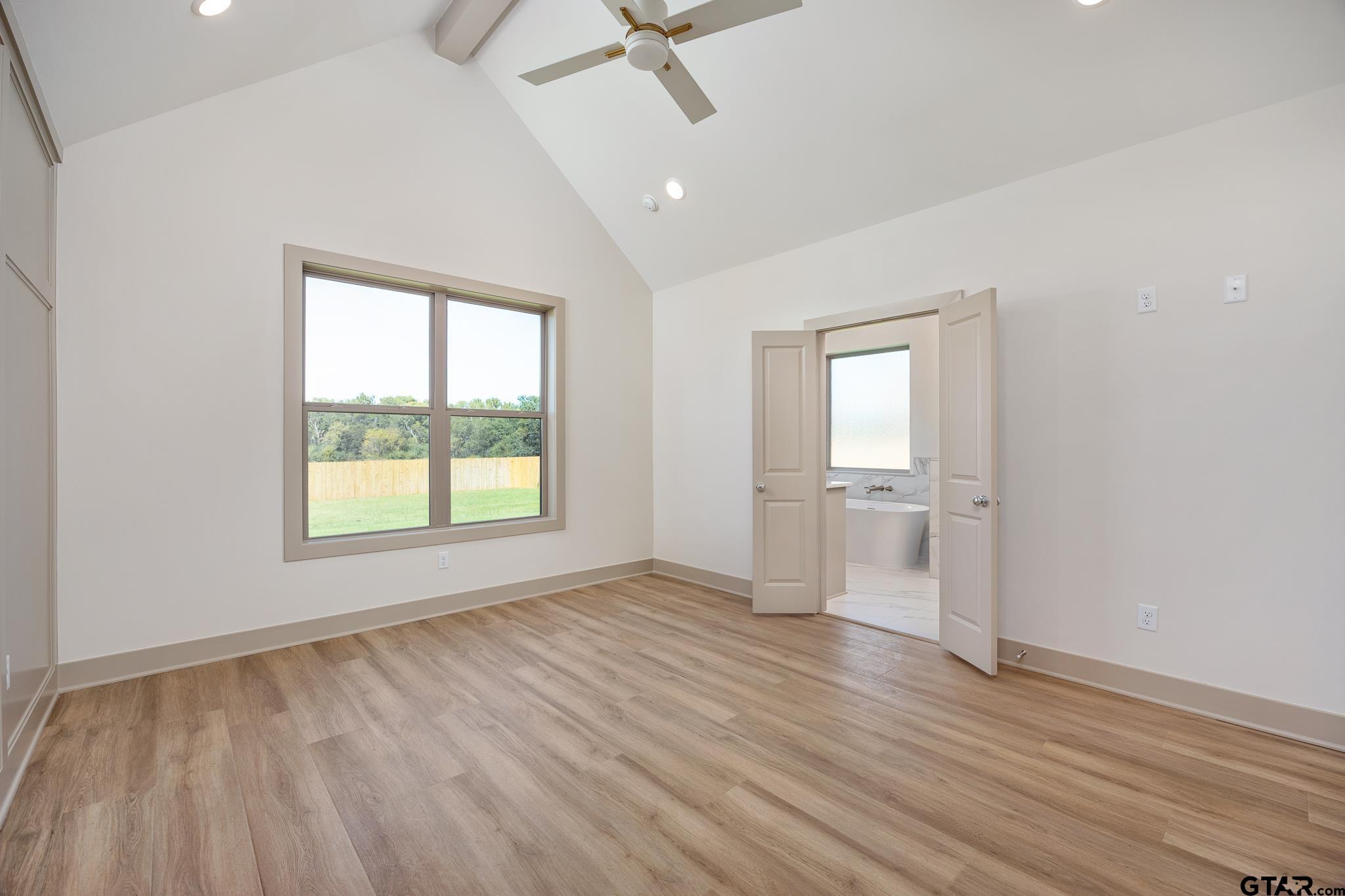 508 Artesian Meadow Drive Bullard, TX 75757 - Photo 25 of 46 wooden floor in an empty room with a window