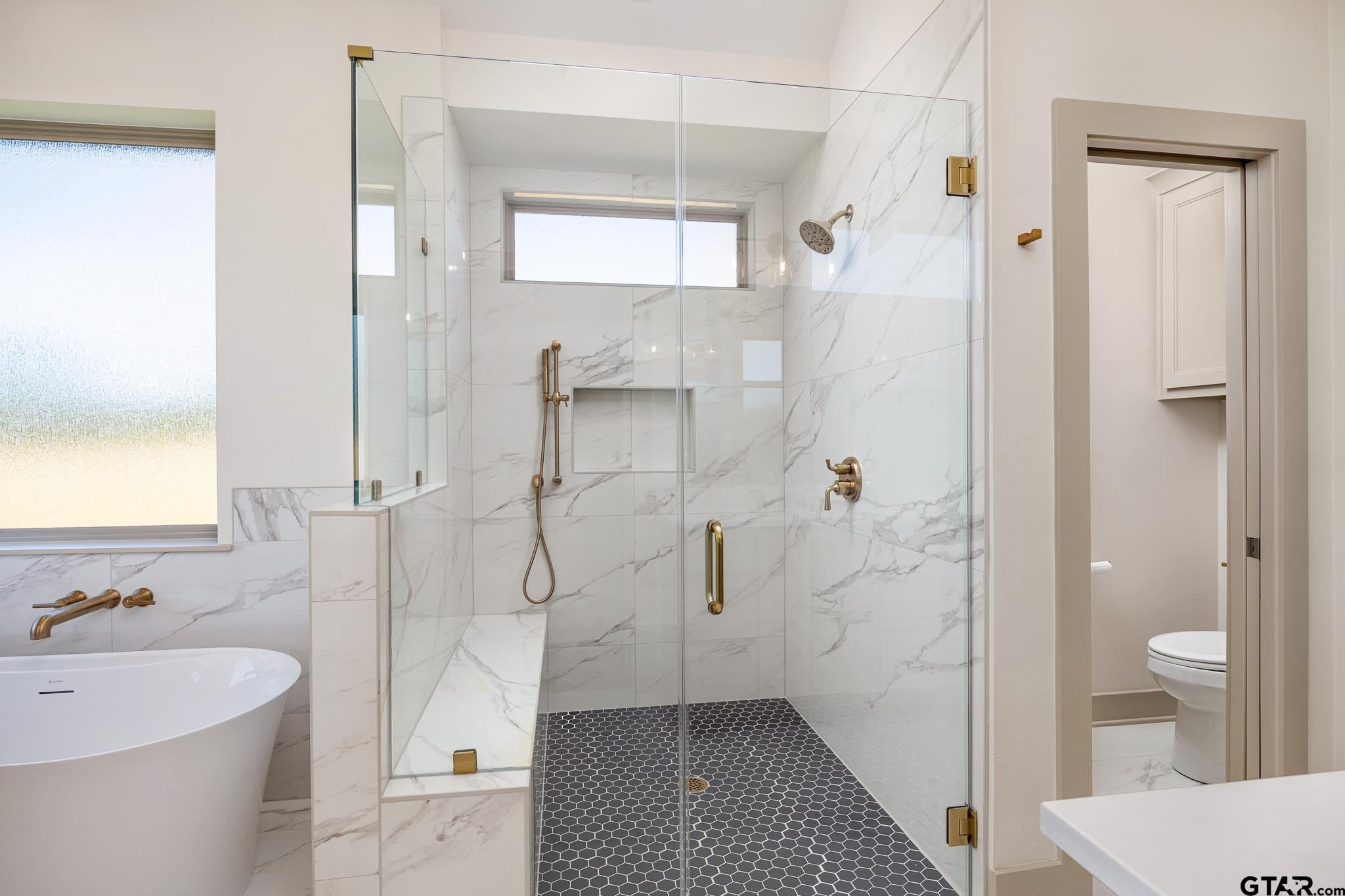 508 Artesian Meadow Drive Bullard, TX 75757 - Photo 28 of 46 a bathroom with a sink a toilet and shower