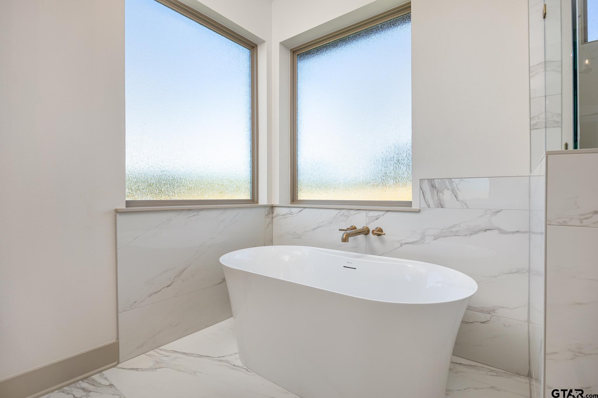 508 Artesian Meadow Drive Bullard, TX 75757 - Photo 29 of 46 a bathroom with a sink and a mirror