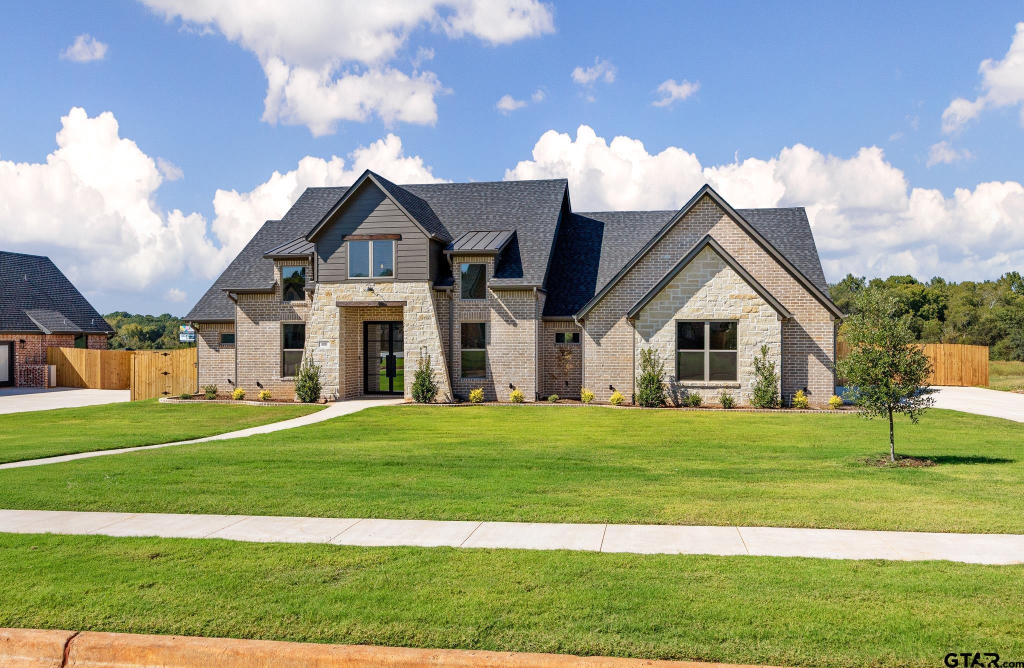 508 Artesian Meadow Drive Bullard, TX 75757 - Photo 3 of 46 a front view of a house with a yard