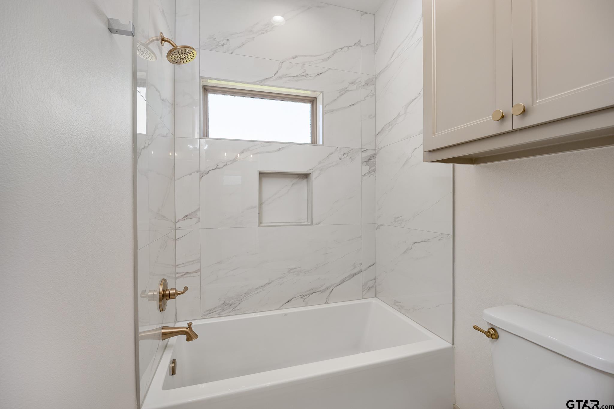 508 Artesian Meadow Drive Bullard, TX 75757 - Photo 34 of 46 a bathroom with a bathtub