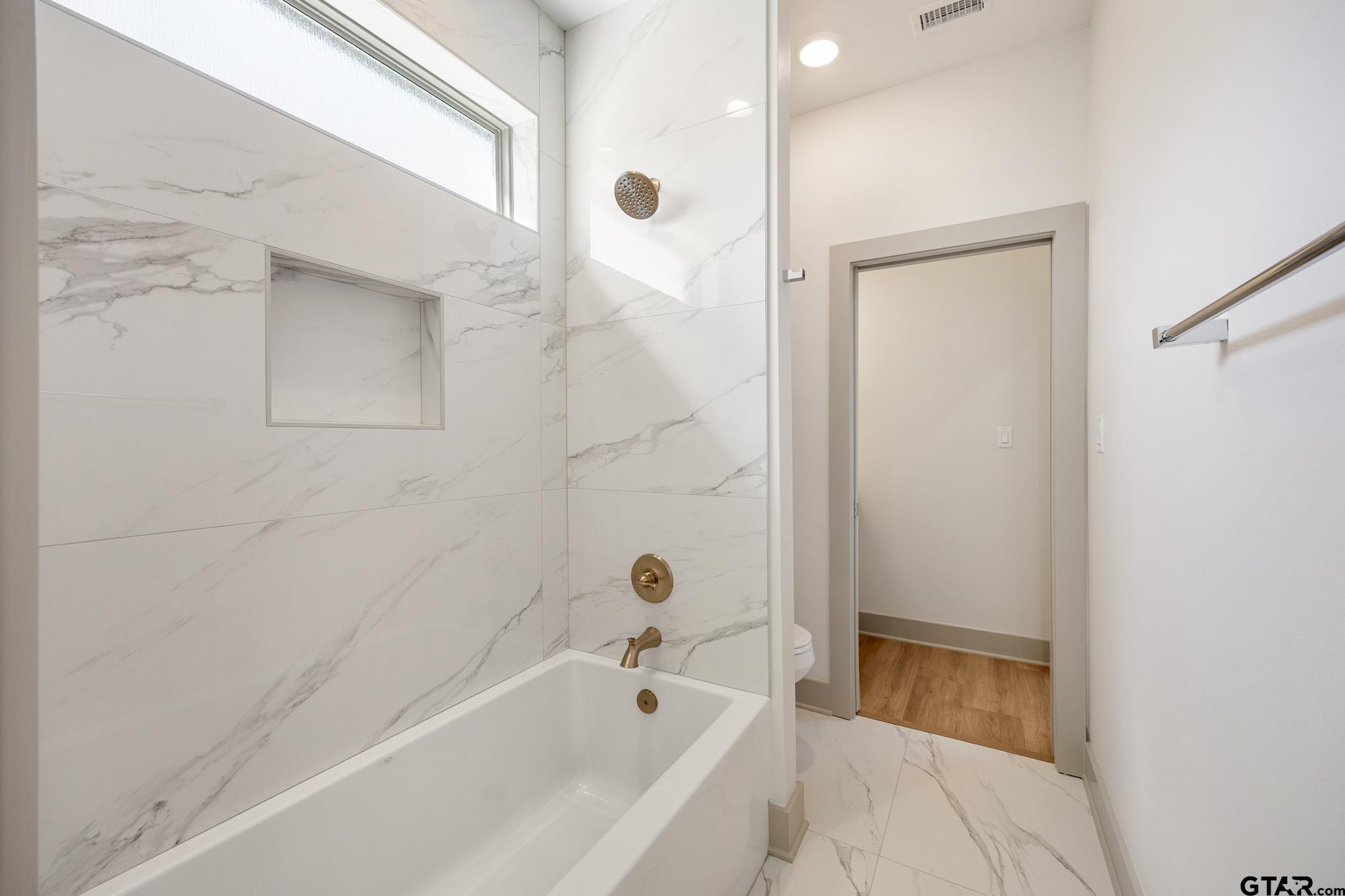 508 Artesian Meadow Drive Bullard, TX 75757 - Photo 37 of 46 a bathroom with a bathtub