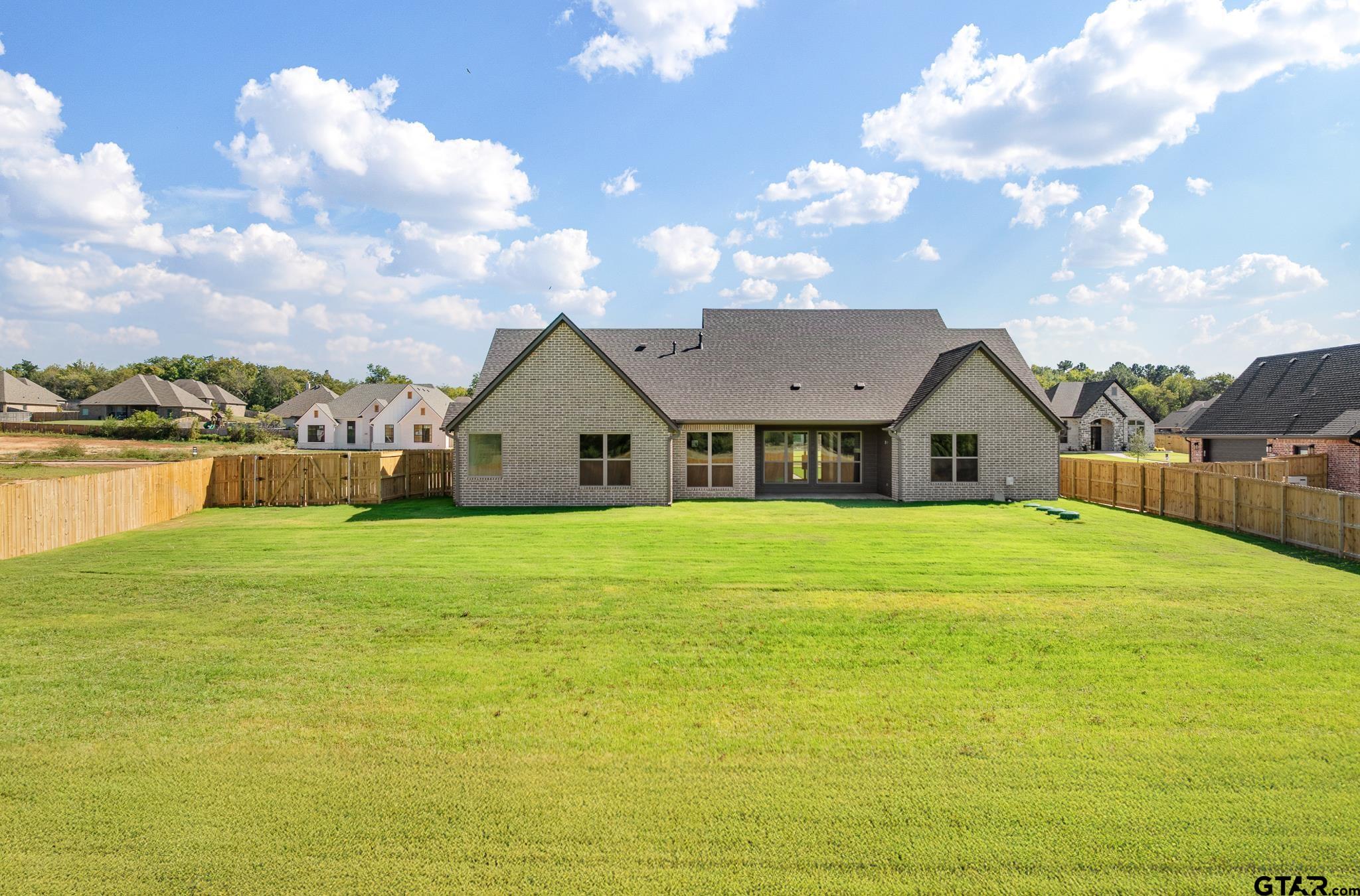 508 Artesian Meadow Drive Bullard, TX 75757 - Photo 44 of 46 a view of house with outdoor space and swimming pool