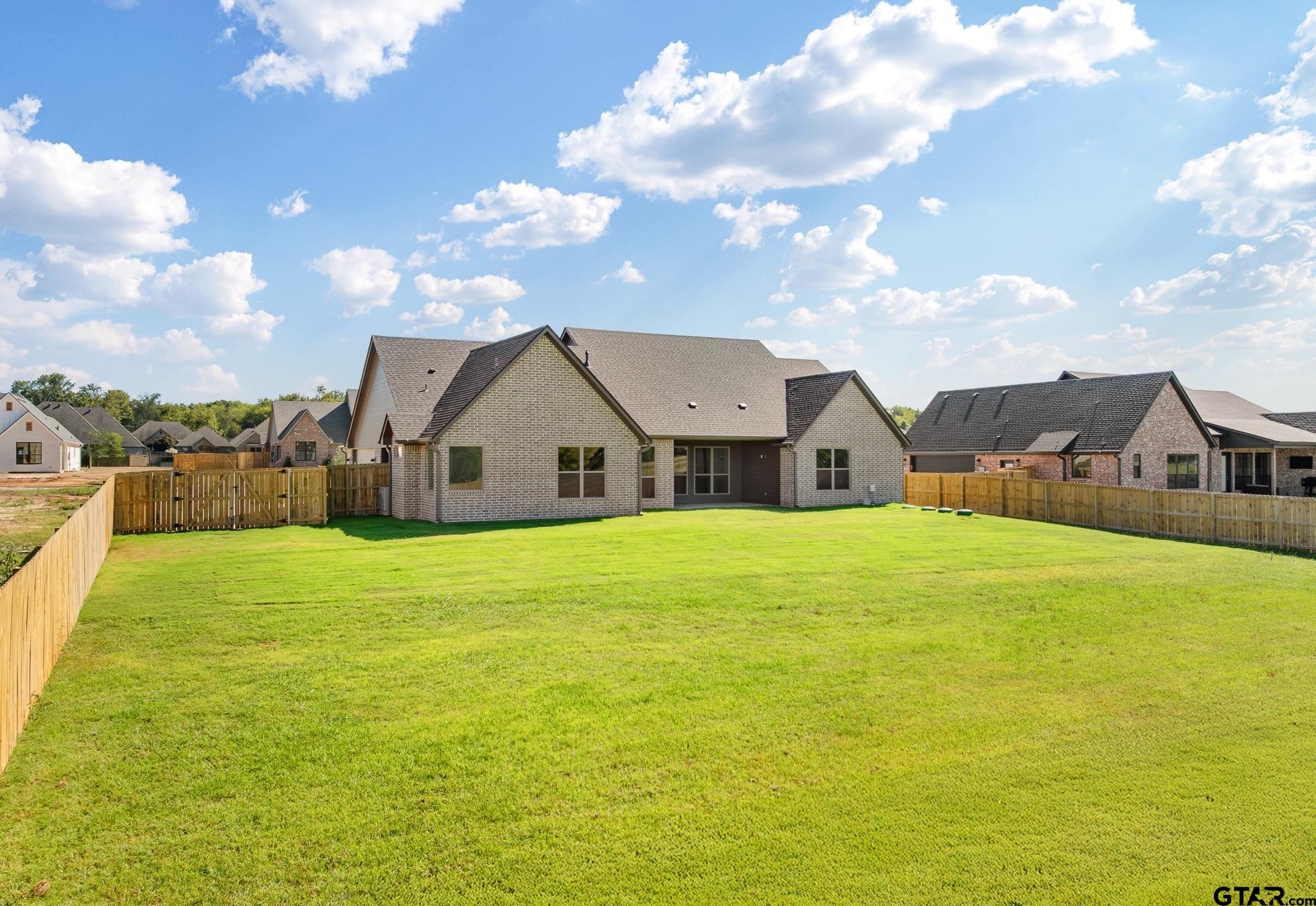 508 Artesian Meadow Drive Bullard, TX 75757 - Photo 45 of 46 a front view of house with an outdoor space and seating