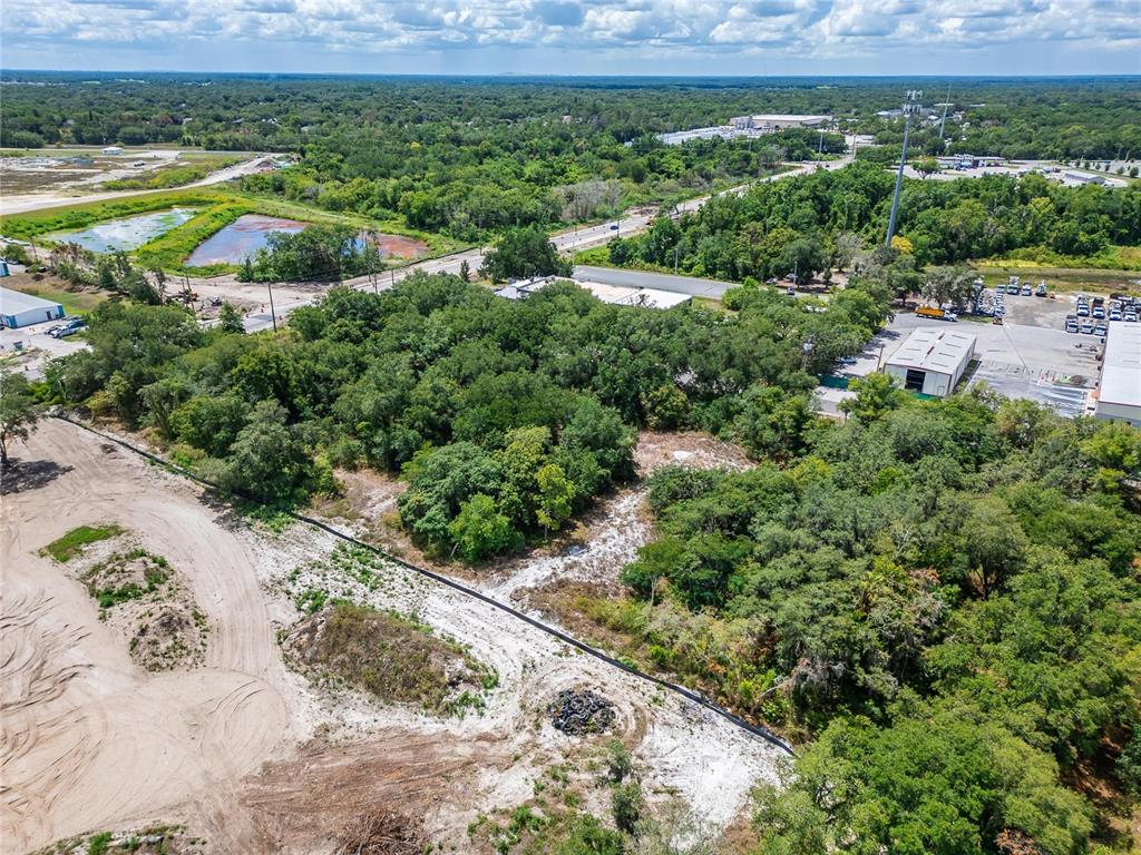 Turkey Creek Road Plant City, FL 33566 - Photo 11 of 35 an aerial view of residential houses with outdoor space and trees
