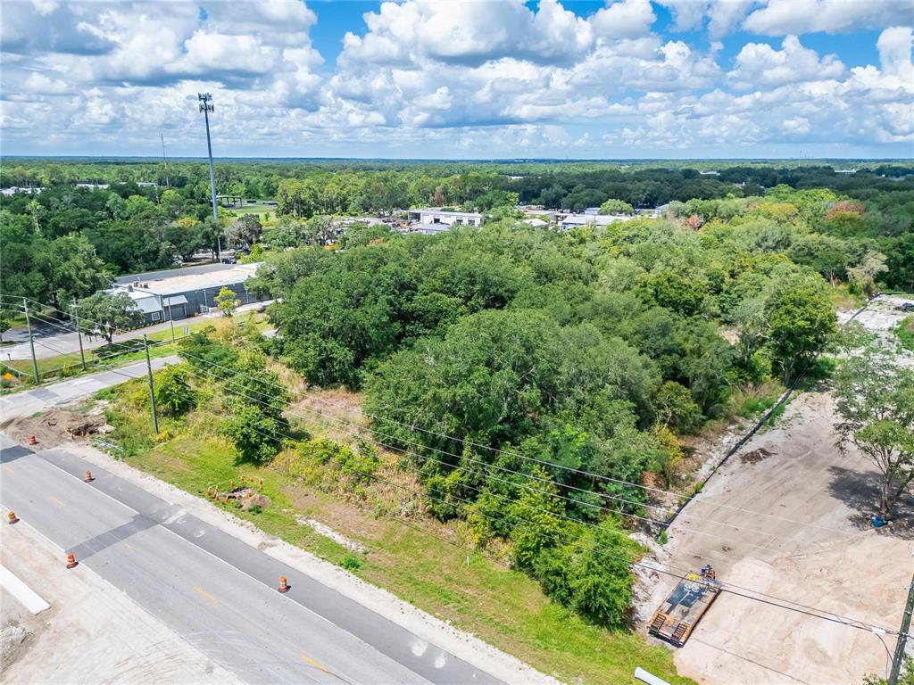 Turkey Creek Road Plant City, FL 33566 - Photo 9 of 35 a view of a garden with a building in the background
