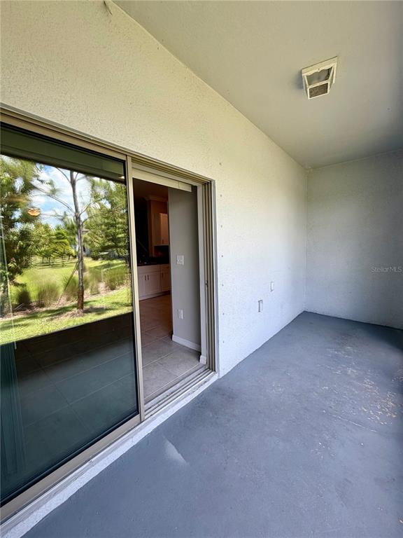 11826 Dumaine Valley Road Riverview, FL 33579 - Photo 35 of 54 wooden floor in an empty room with a window
