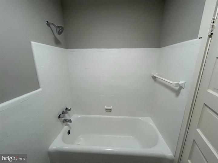 1630 16th Street Southeast, Unit 2 Washington, DC 20020 - Photo 14 of 15 a bathroom with a bathtub