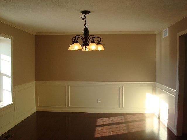 1646 Belclare Road Normal, IL 61761 - Photo 2 of 6 a view of empty room with window and chandelier fan