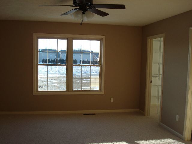 1646 Belclare Road Normal, IL 61761 - Photo 5 of 6 an empty room with a window