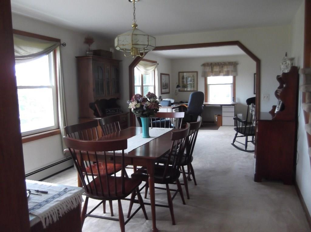 140 Ames Road Dover-Foxcroft, ME 04426 - Photo 10 of 30 Formal dining room with arch way to...