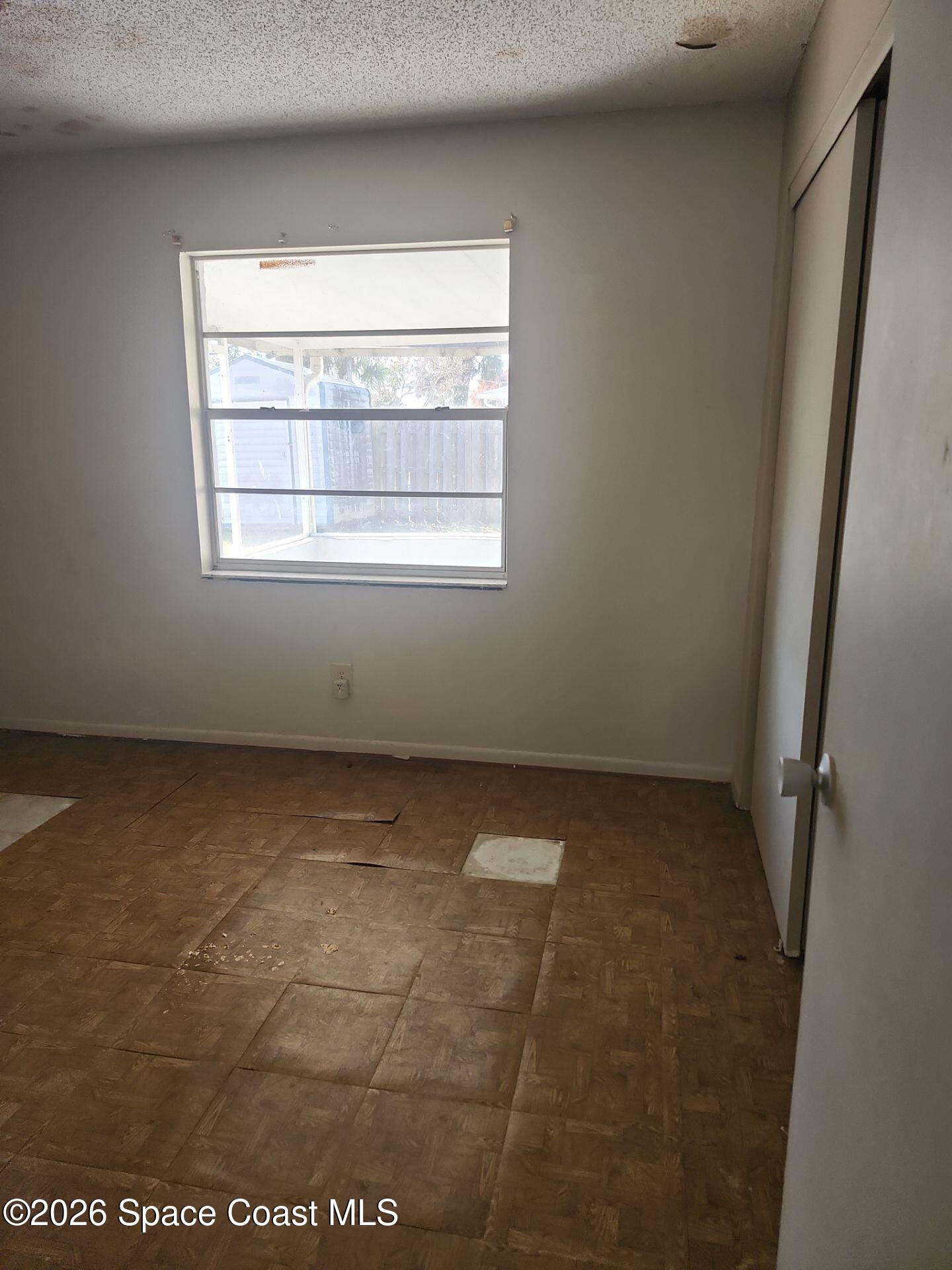 2972 Matthew Drive Rockledge, FL 32955 - Photo 20 of 24 a view of an empty room with a window