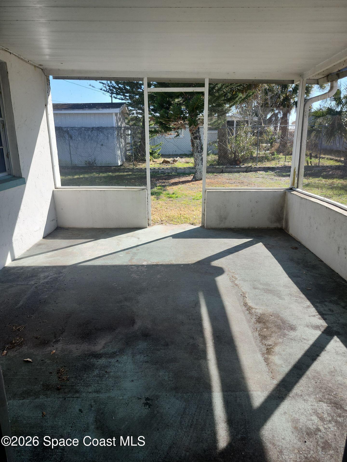 2972 Matthew Drive Rockledge, FL 32955 - Photo 23 of 24 swimming pool view with glass door